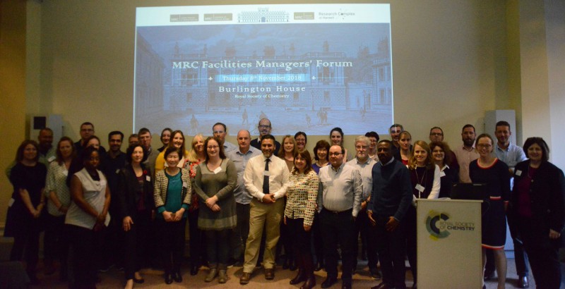 Group photo of people at presentation